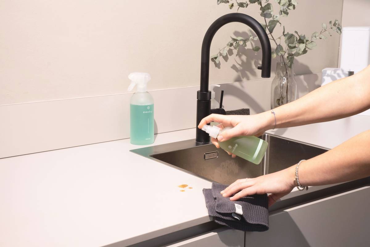 comparison of biodegradable dish soap suds breaking down in water vs conventional soap residue